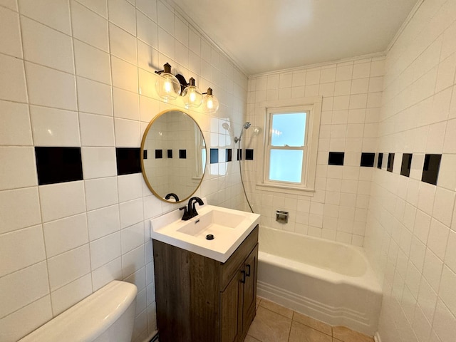 full bath with shower / bath combination, toilet, tile patterned flooring, vanity, and tile walls