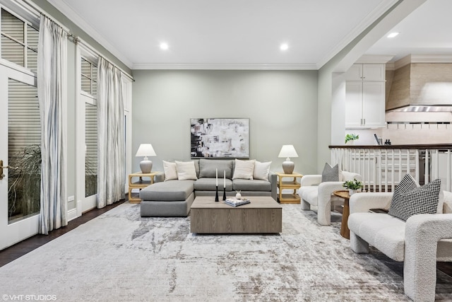 living area with recessed lighting, wood finished floors, and crown molding