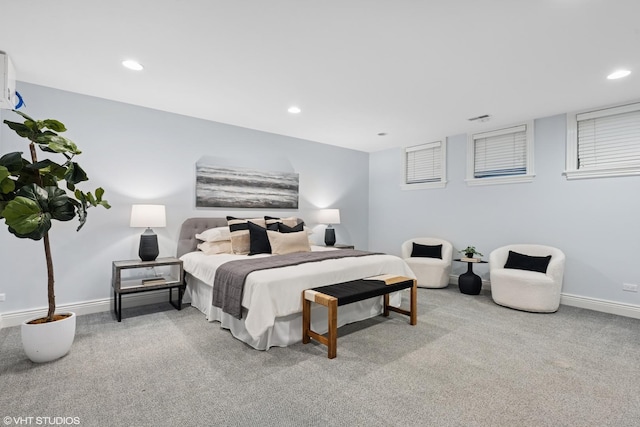 carpeted bedroom with baseboards, visible vents, and recessed lighting