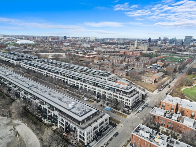 birds eye view of property with a city view