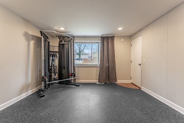 workout area featuring baseboards