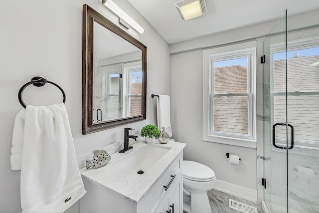 bathroom with visible vents, plenty of natural light, and a shower stall