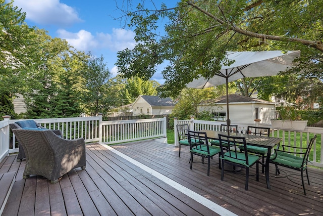 wooden deck with outdoor dining space