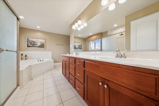 bathroom featuring double vanity, a bath, tile patterned flooring, a shower stall, and a sink