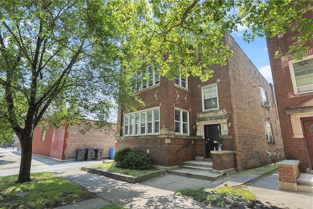 view of front of property with brick siding