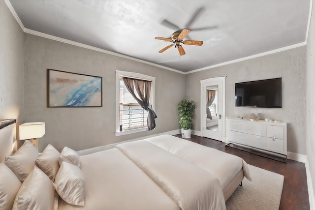 bedroom featuring dark wood-type flooring, ornamental molding, baseboards, and a ceiling fan