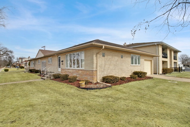 2547 2nd Ave, North Riverside, IL 60546 - view of home's exterior featuring a garage, brick siding, driveway, and a yard