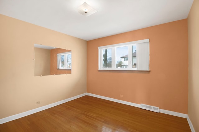 2547 2nd Ave, North Riverside, IL 60546 - unfurnished room featuring baseboards and wood finished floors