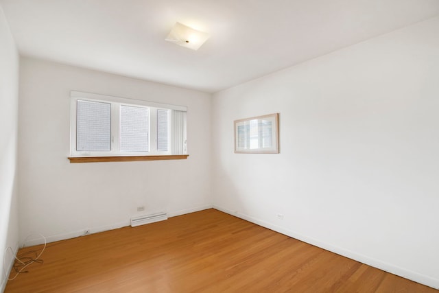 2547 2nd Ave, North Riverside, IL 60546 - unfurnished room with light wood-style flooring and baseboards