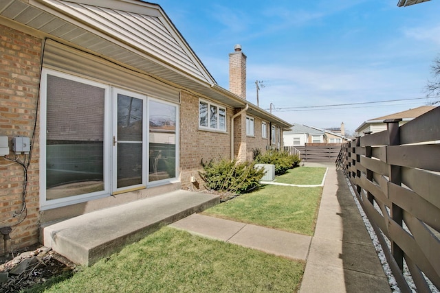 2547 2nd Ave, North Riverside, IL 60546 - view of side of home with a chimney and brick siding