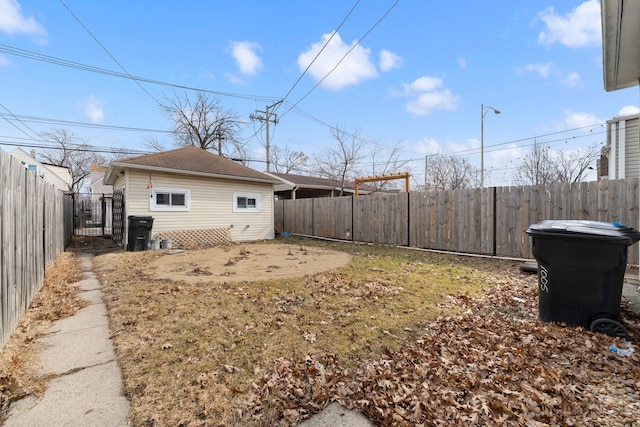 view of yard with a fenced backyard