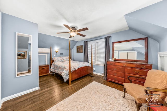 bedroom featuring lofted ceiling, dark wood-style floors, ceiling fan, and baseboards