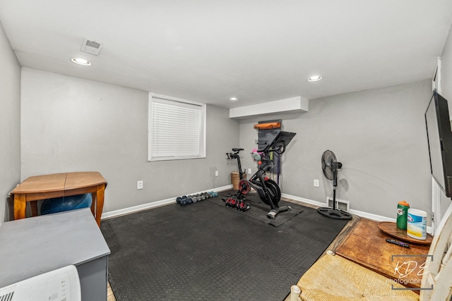 workout area with recessed lighting, visible vents, and baseboards