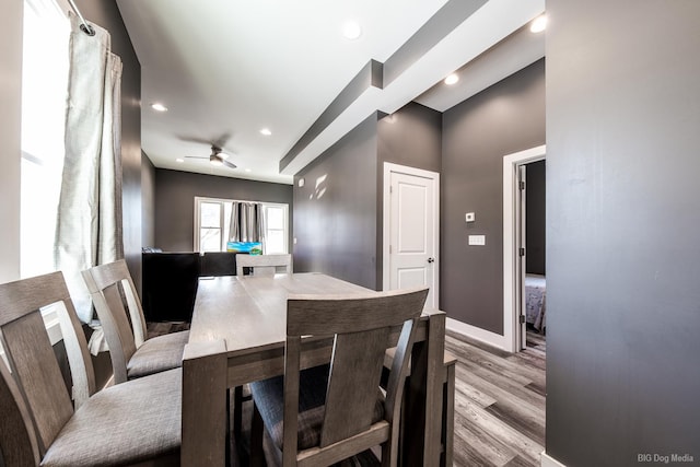 dining space featuring a ceiling fan, recessed lighting, baseboards, and wood finished floors