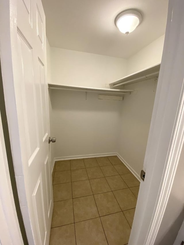 walk in closet featuring tile patterned floors