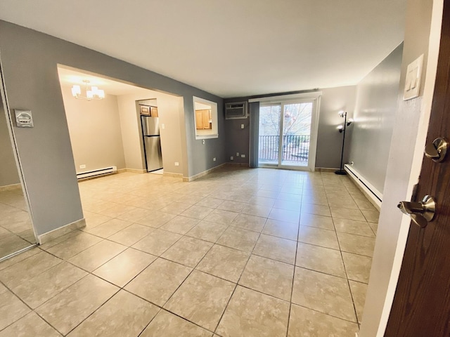 unfurnished room featuring a chandelier, light tile patterned flooring, a baseboard heating unit, baseboard heating, and a wall mounted AC