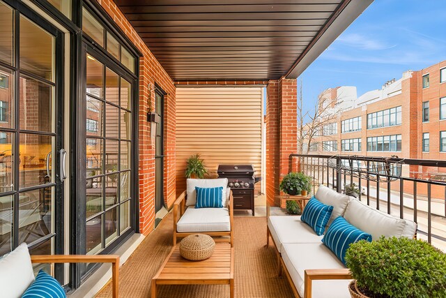 balcony featuring a grill and an outdoor hangout area