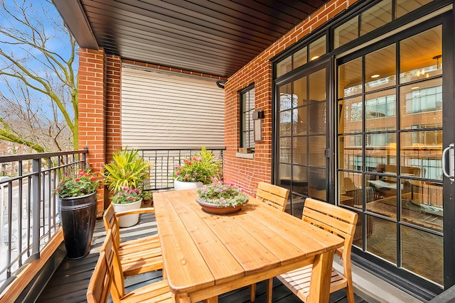 balcony featuring outdoor dining area