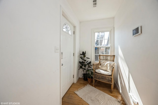 entryway featuring visible vents and light wood-type flooring