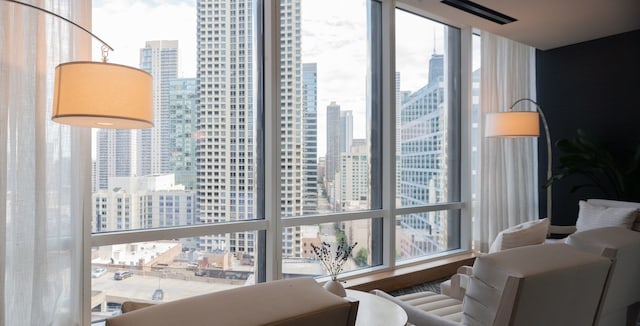 interior space featuring expansive windows and a city view