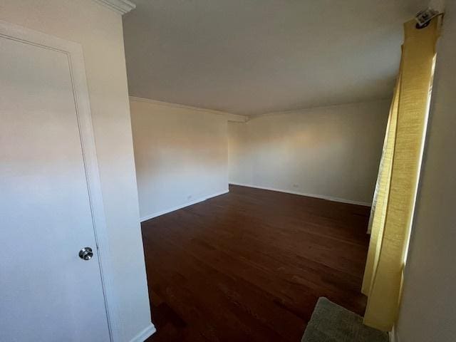 unfurnished room featuring wood finished floors