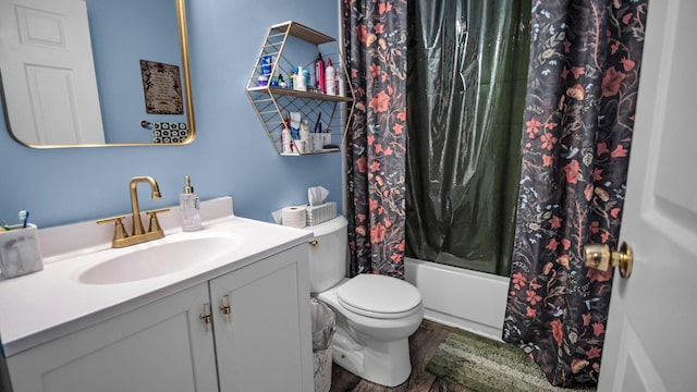 full bathroom with toilet, wood finished floors, vanity, and shower / tub combo with curtain