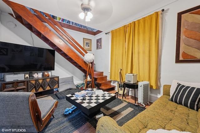 2531 W Lyndale St, Chicago, IL 60647 - living area with radiator, stairs, and ceiling fan