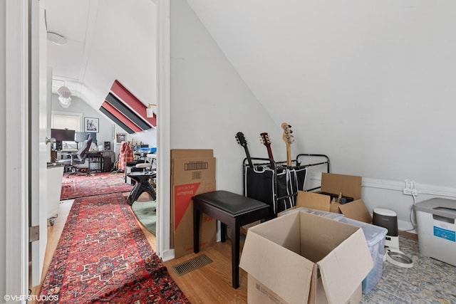 2531 W Lyndale St, Chicago, IL 60647 - bonus room with vaulted ceiling, an office area, and wood finished floors