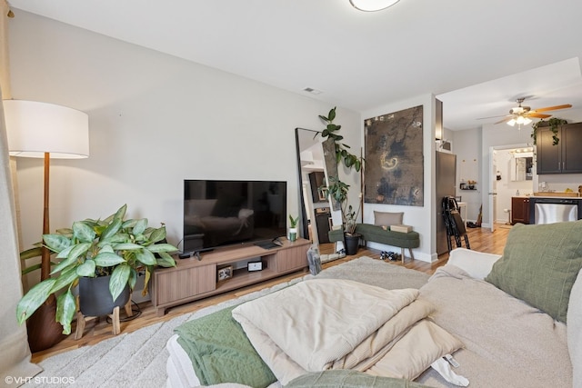 2531 W Lyndale St, Chicago, IL 60647 - living area featuring light wood-type flooring and a ceiling fan