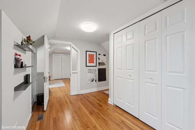 2531 W Lyndale St, Chicago, IL 60647 - hallway with light wood-style flooring and lofted ceiling