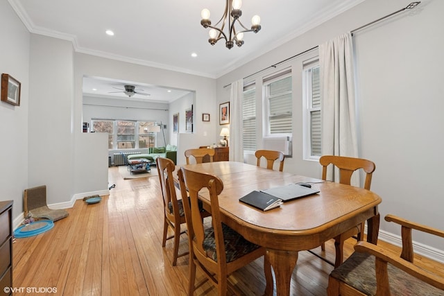 2531 W Lyndale St, Chicago, IL 60647 - dining area featuring light wood-style flooring, recessed lighting, crown molding, a chandelier, and radiator
