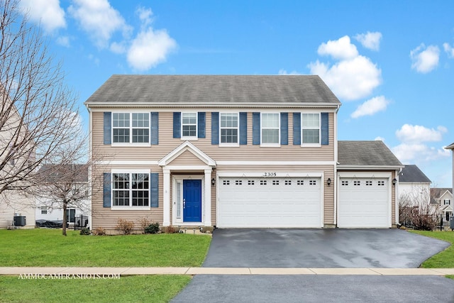 view of front of home with aphalt driveway, central AC unit, and a front lawn