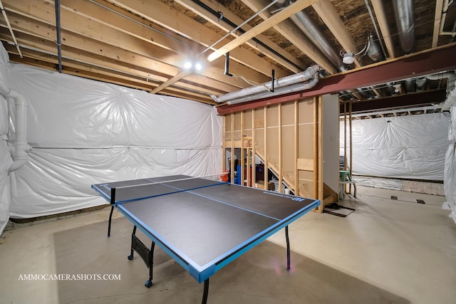 recreation room with concrete floors