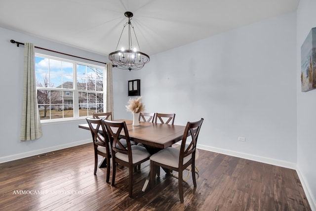 dining room with visible vents, baseboards, a chandelier, and dark wood-style flooring