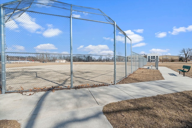 view of property's community with fence