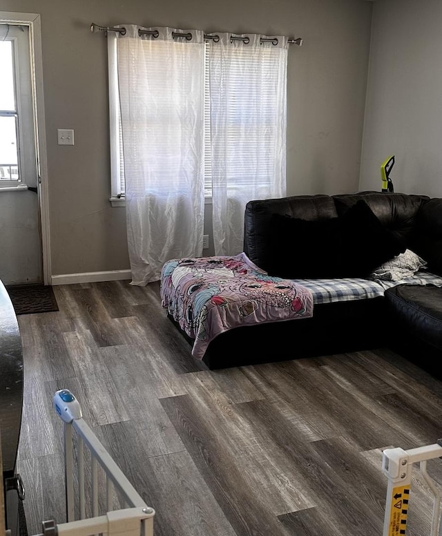 bedroom with wood finished floors