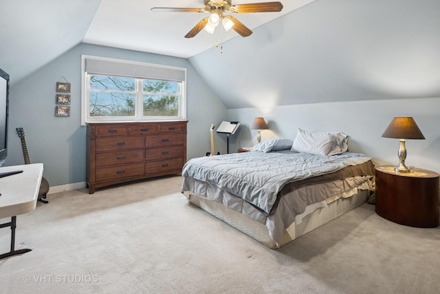 bedroom featuring lofted ceiling, carpet floors, a ceiling fan, and baseboards