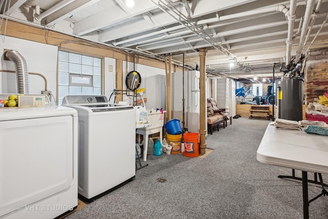 below grade area with plenty of natural light, water heater, and independent washer and dryer