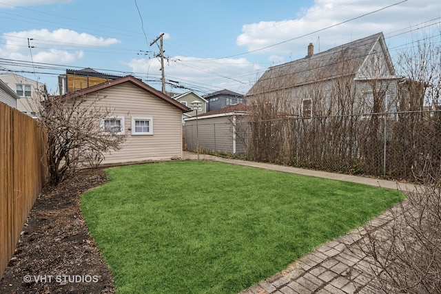 view of yard with a fenced backyard