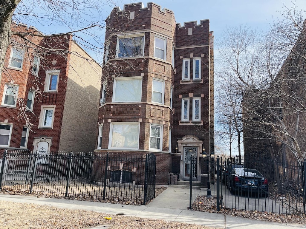 view of property featuring a fenced front yard