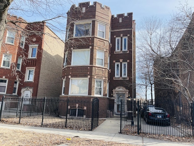 view of property featuring a fenced front yard