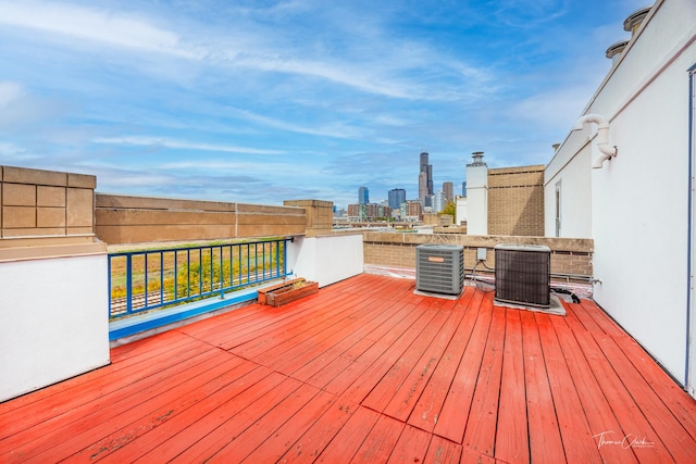 deck featuring a view of city and central AC