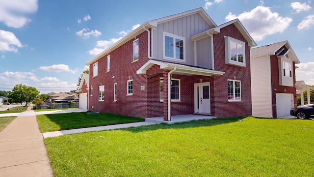 view of front of home featuring a garage, a front lawn, board and batten siding, and brick siding