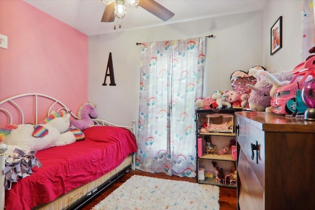 bedroom featuring ceiling fan and wood finished floors