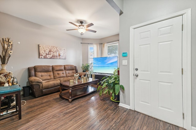 5412 S Wood St, Chicago, IL 60609 - living area featuring baseboards, dark wood-style flooring, and a ceiling fan