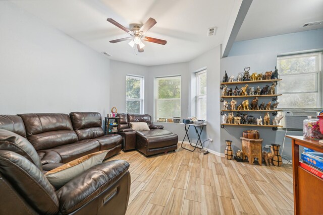 5412 S Wood St, Chicago, IL 60609 - living area featuring visible vents, wood finished floors, and ceiling fan