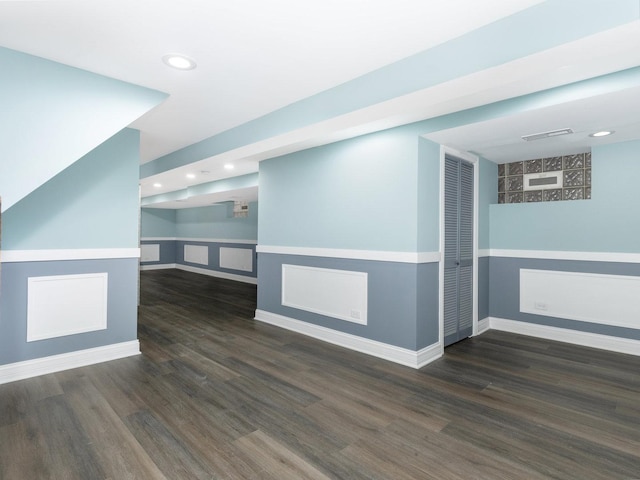 interior space with recessed lighting, visible vents, baseboards, and wood finished floors