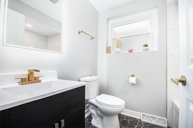 full bathroom featuring toilet, vanity, visible vents, baseboards, and marble finish floor