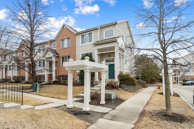 view of front of home featuring a pergola