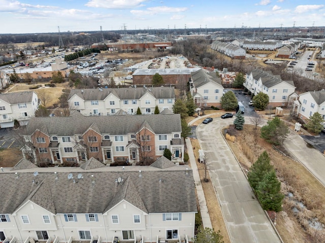 birds eye view of property with a residential view